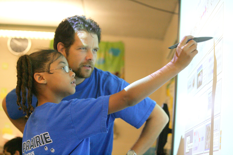 A student and a teacher of the international associate teacher program